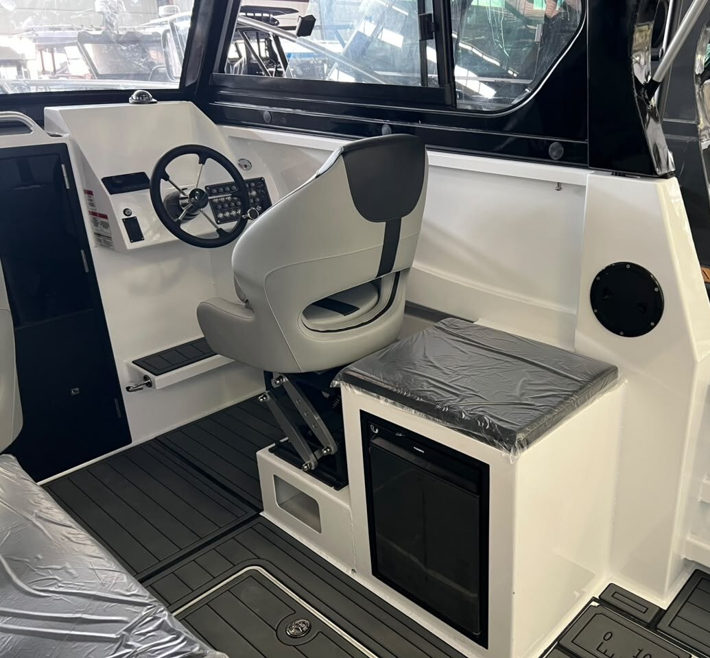 EO750 helm station and fridge