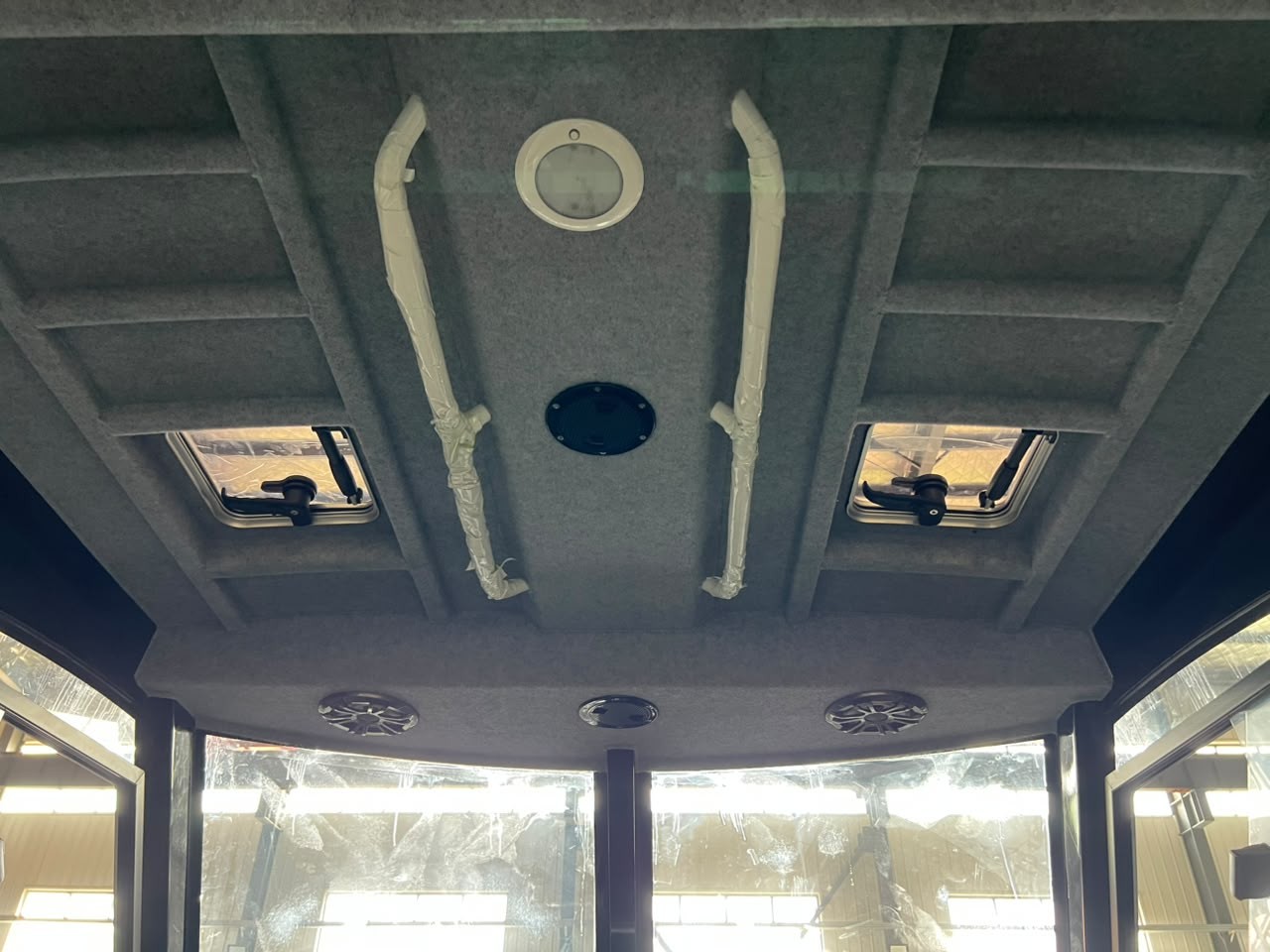 EO750 cabin headliner and grab rails